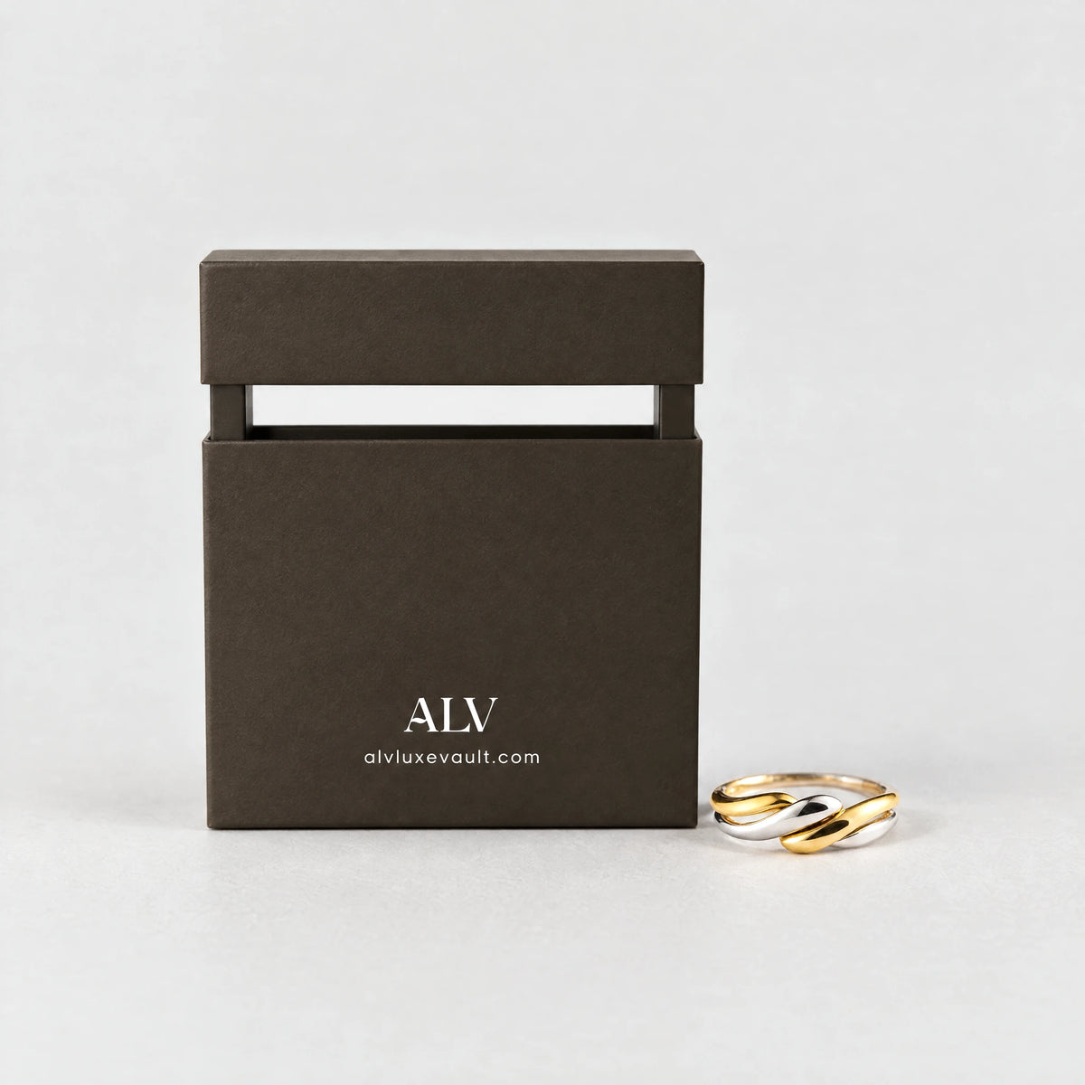 Siena Two-Tone Twist Ring beside the ALV gift box