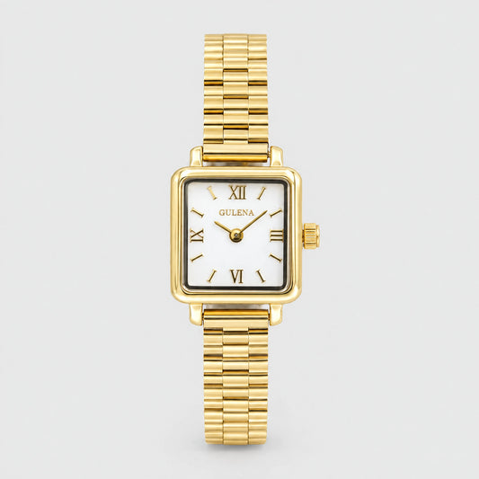 CLARA Square Bracelet Watch in gold tone with a white Roman numeral dial on a light grey background