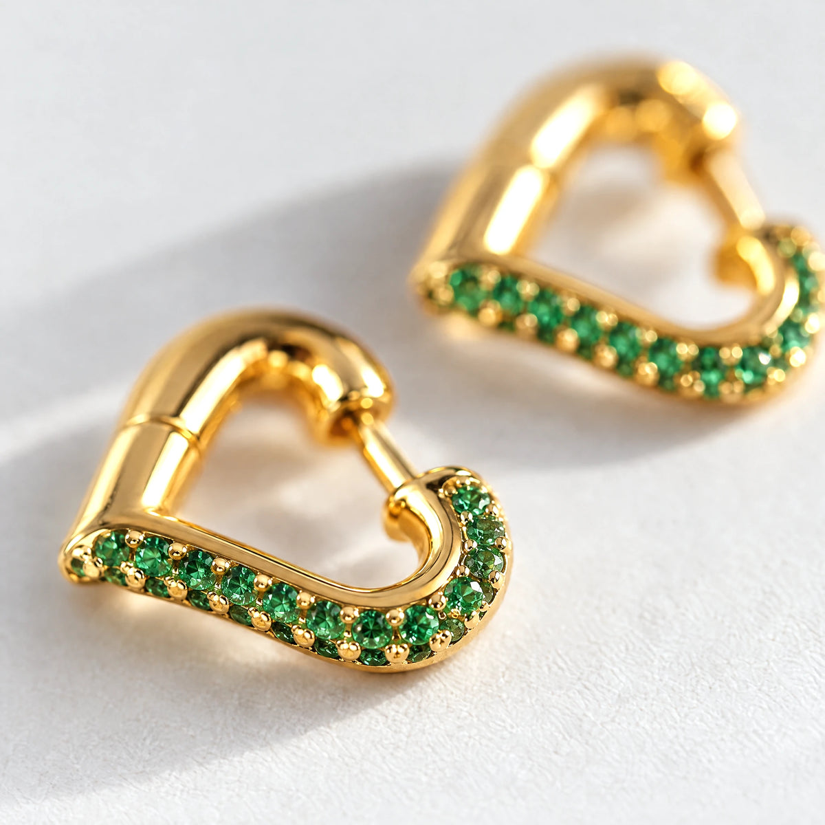 Close-up of the pavé crystals on the Cora Crystal Heart Hoop Earrings