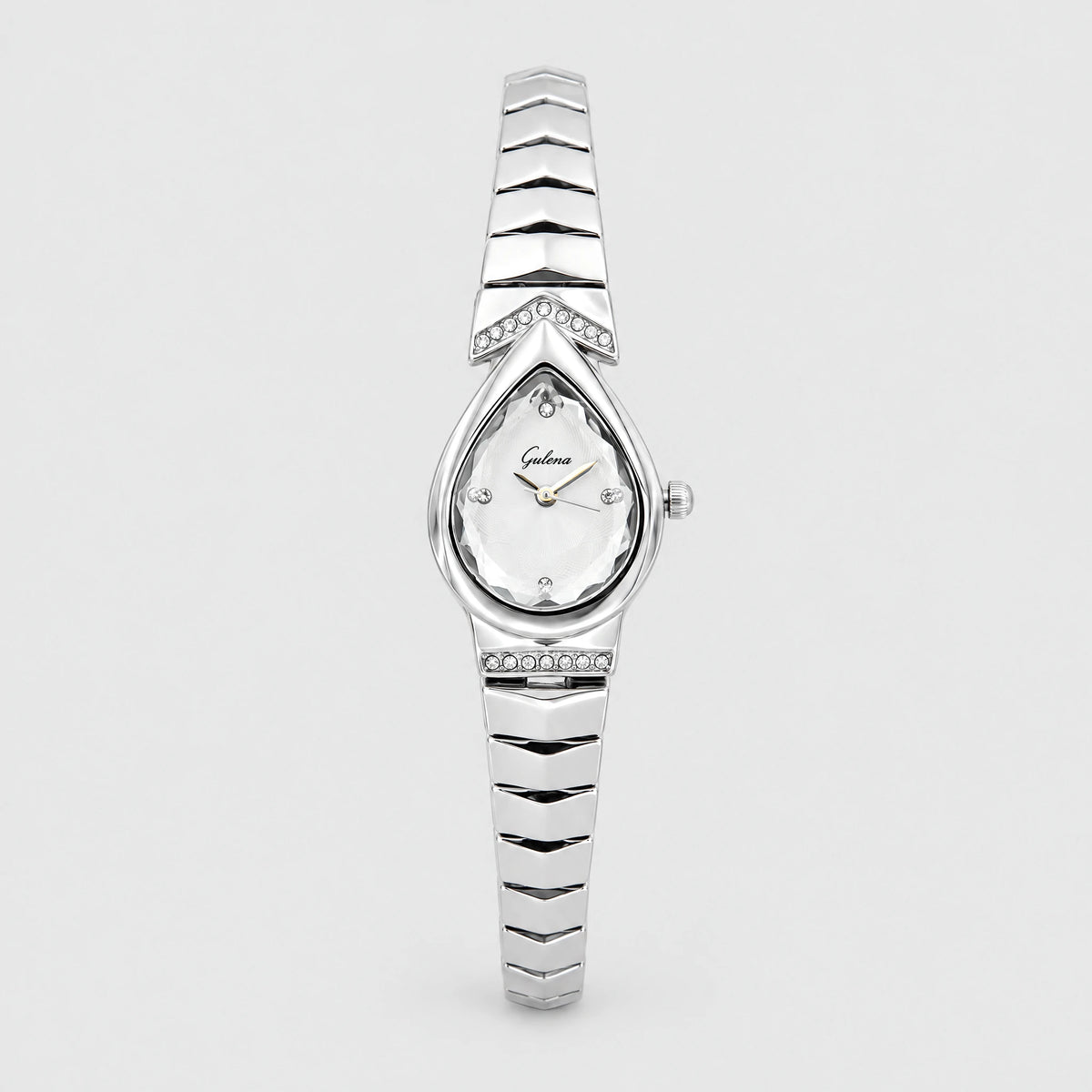 ISLA Teardrop Bracelet Watch in silver tone with a faceted teardrop dial and crystal-set chevron plates
