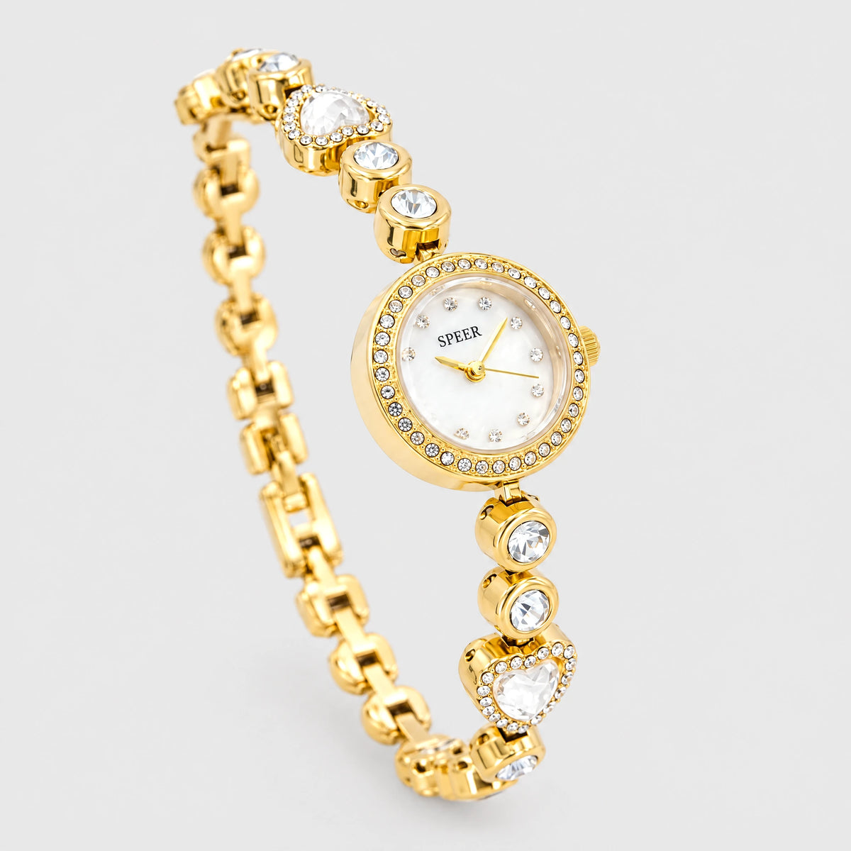 LOLA Heart Bracelet Watch in gold tone with a crystal-rimmed dial and heart links