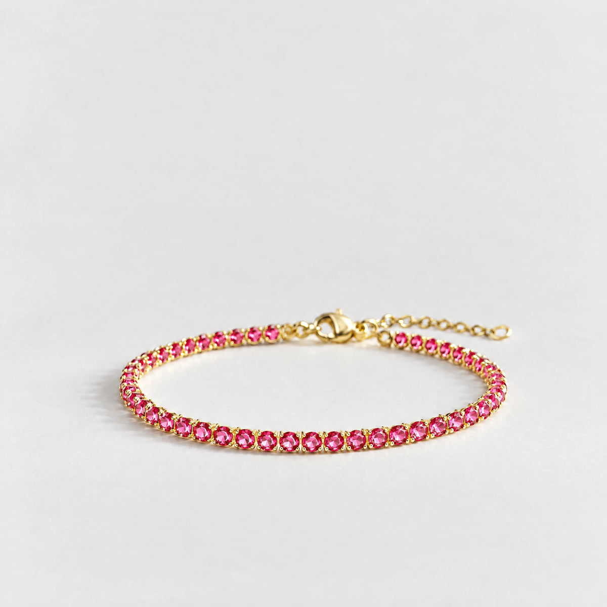 MAYA Birthstone Tennis Bracelet in gold plating with rose-pink crystals for July