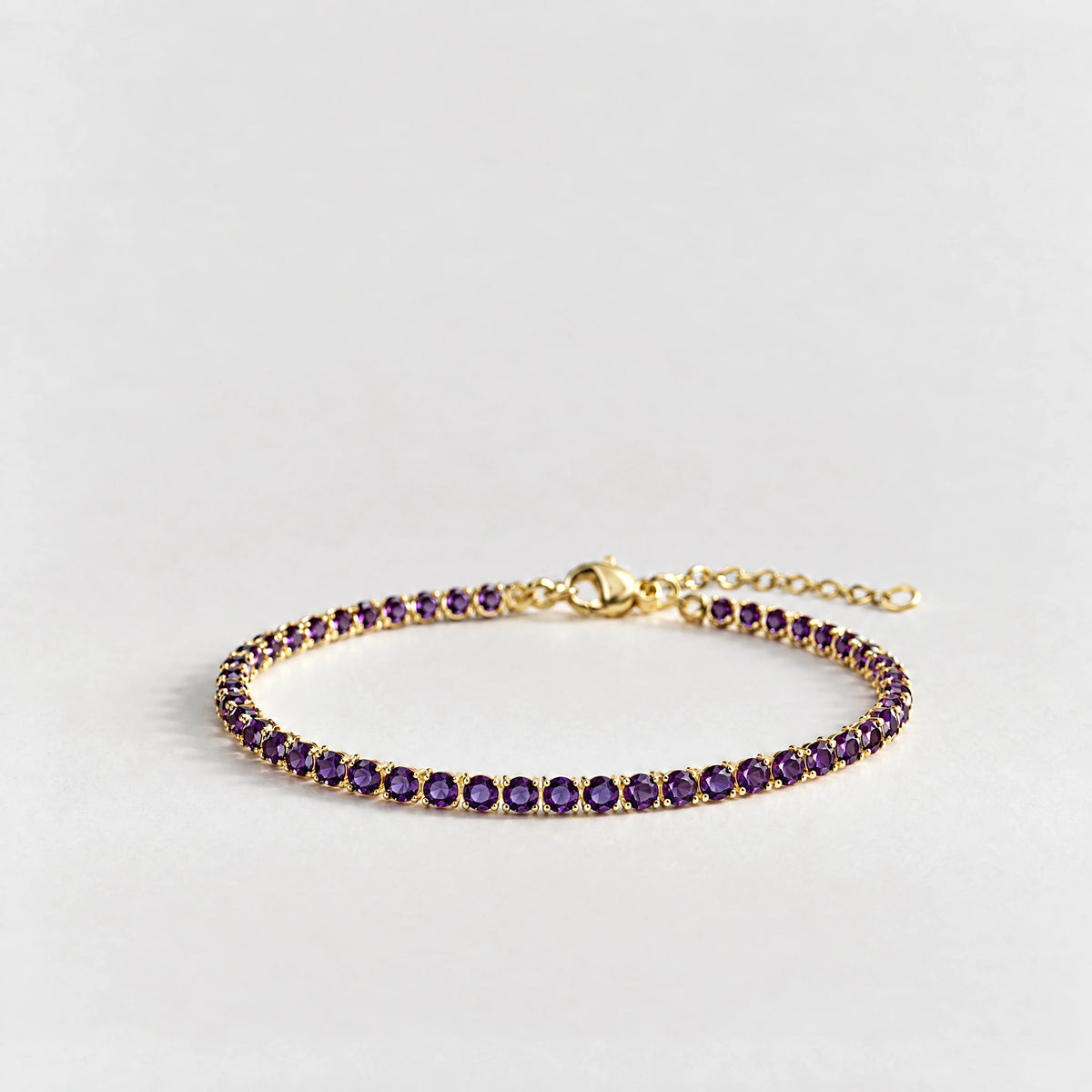 MAYA Birthstone Tennis Bracelet in gold plating with amethyst-purple crystals for June