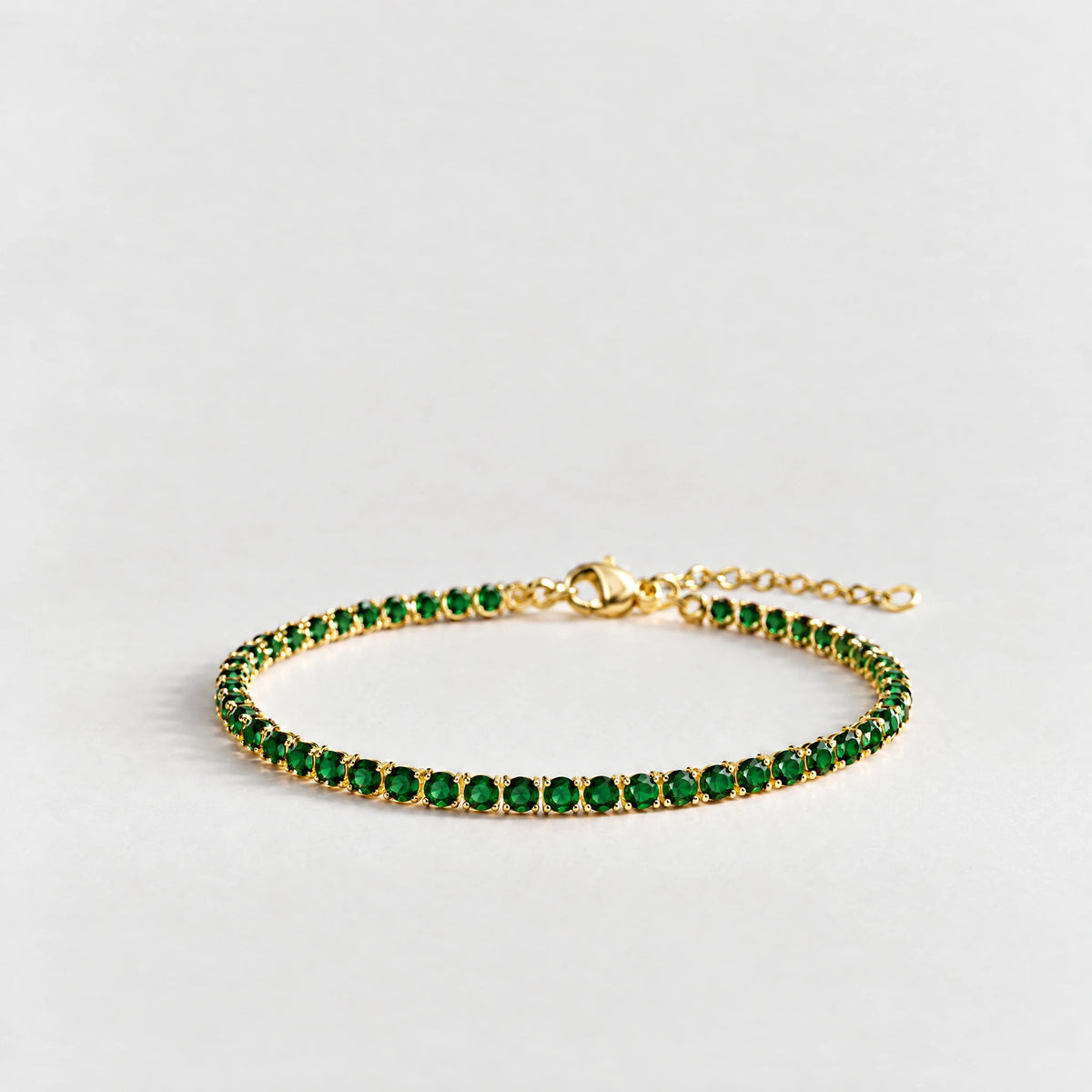 MAYA Birthstone Tennis Bracelet in gold plating with emerald-green crystals for May