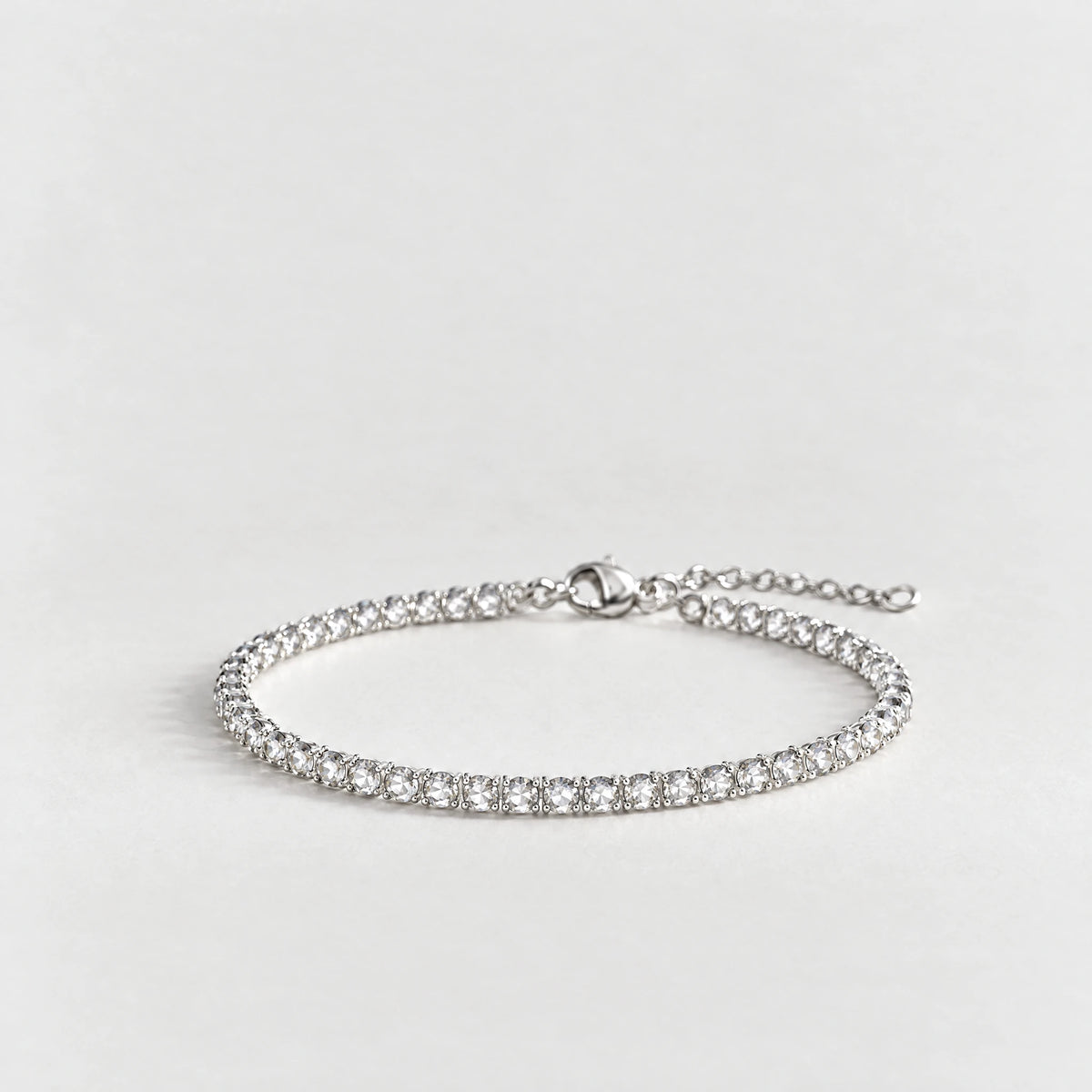 MAYA Birthstone Tennis Bracelet in silver plating with clear crystals for April