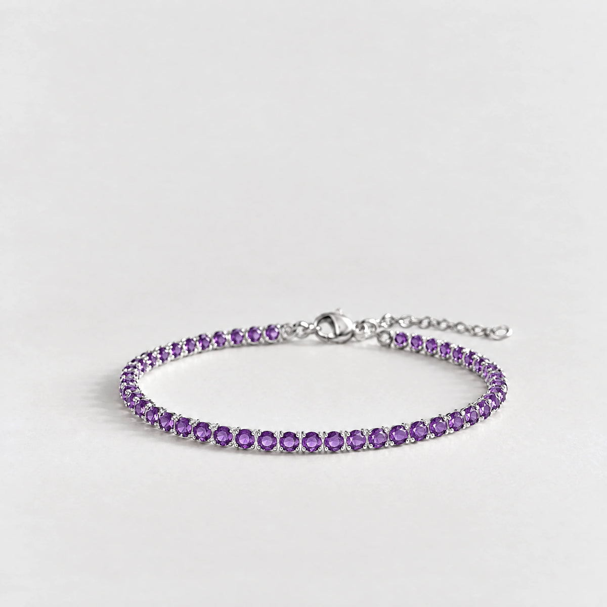 MAYA Birthstone Tennis Bracelet in silver plating with violet crystals for February