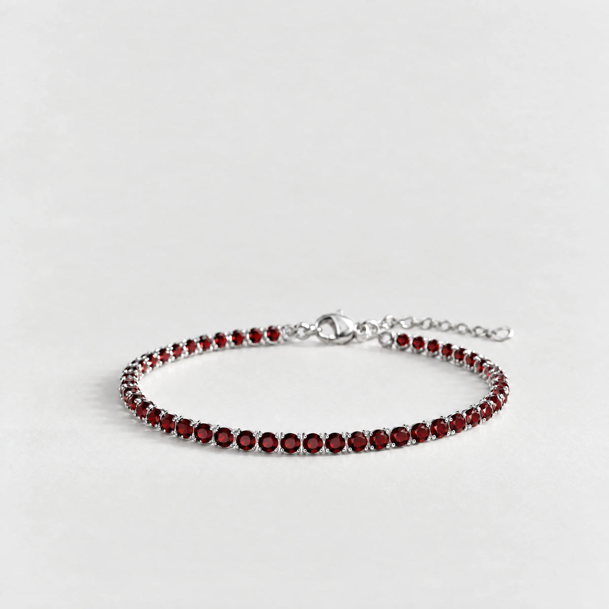 MAYA Birthstone Tennis Bracelet in silver plating with garnet-red crystals for January