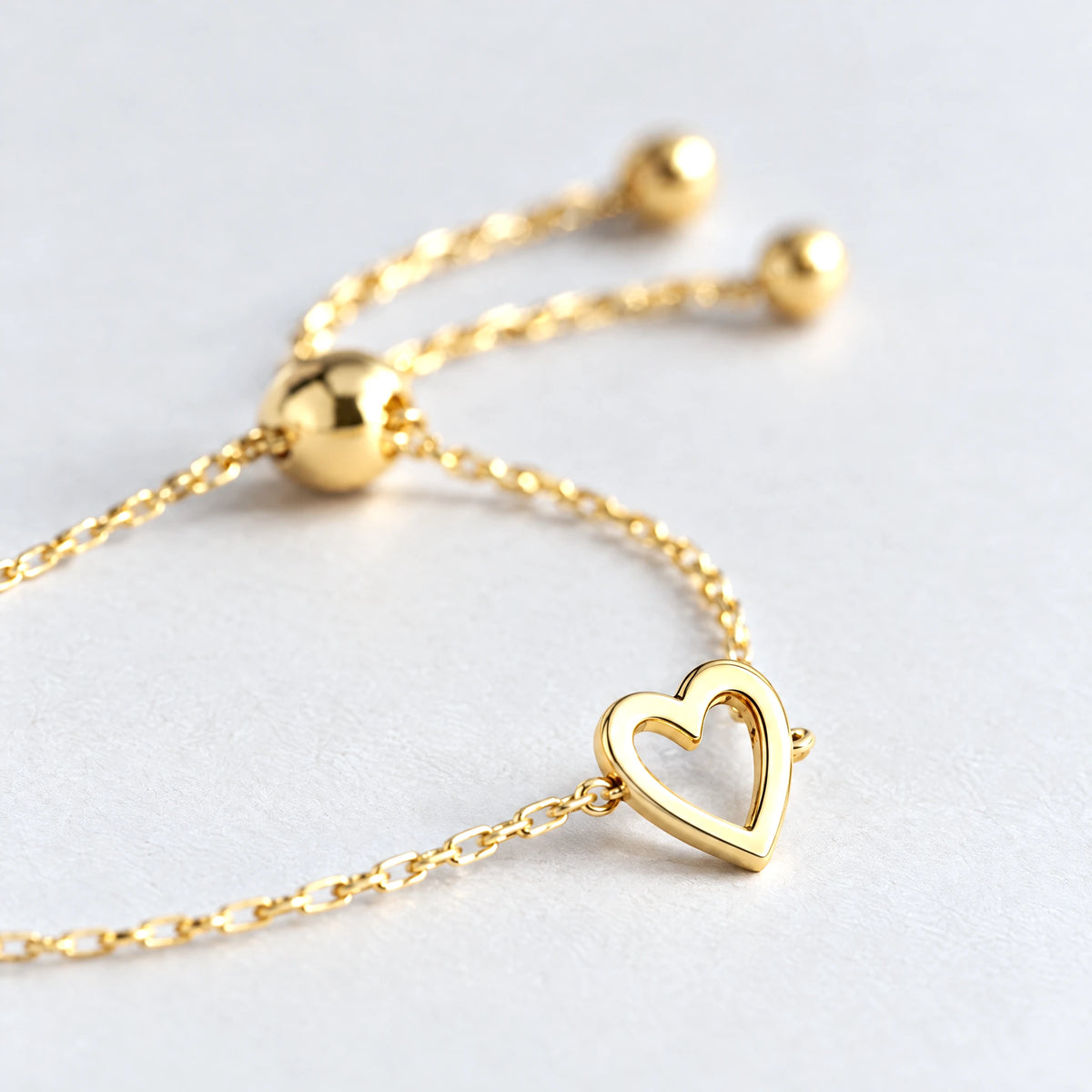 Close-up of the open heart and slider closure on the Rosie Two Hearts Bracelet Set